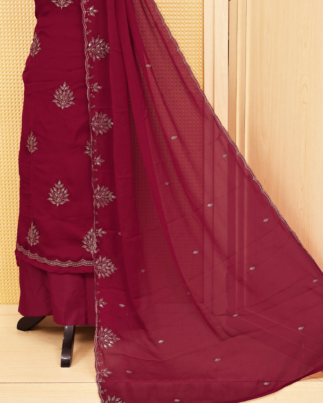 Deep Red colour salwar material featuring Thread with Sequin work on body, paired with matching bottom & dupatta.