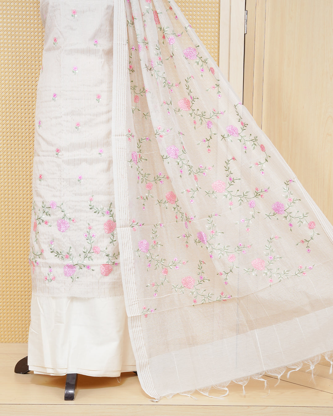 Cream colour tissue salwar material featuring striped body with elegant floral Thread Work, paired with a matching bottom and an elegant dupatta.