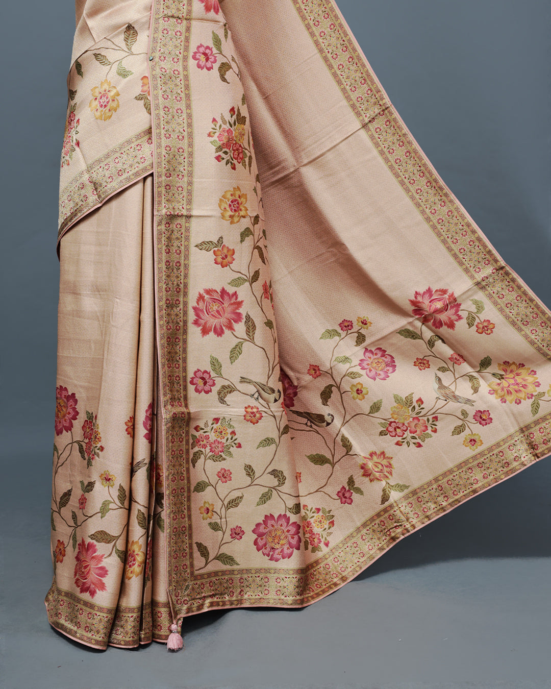 Baby Pink Colour Pashmina Saree featuring a Patterned body, complemented by Self colour with Floral pattern & gold zari on border and Pallu, comes with matching blouse piece.