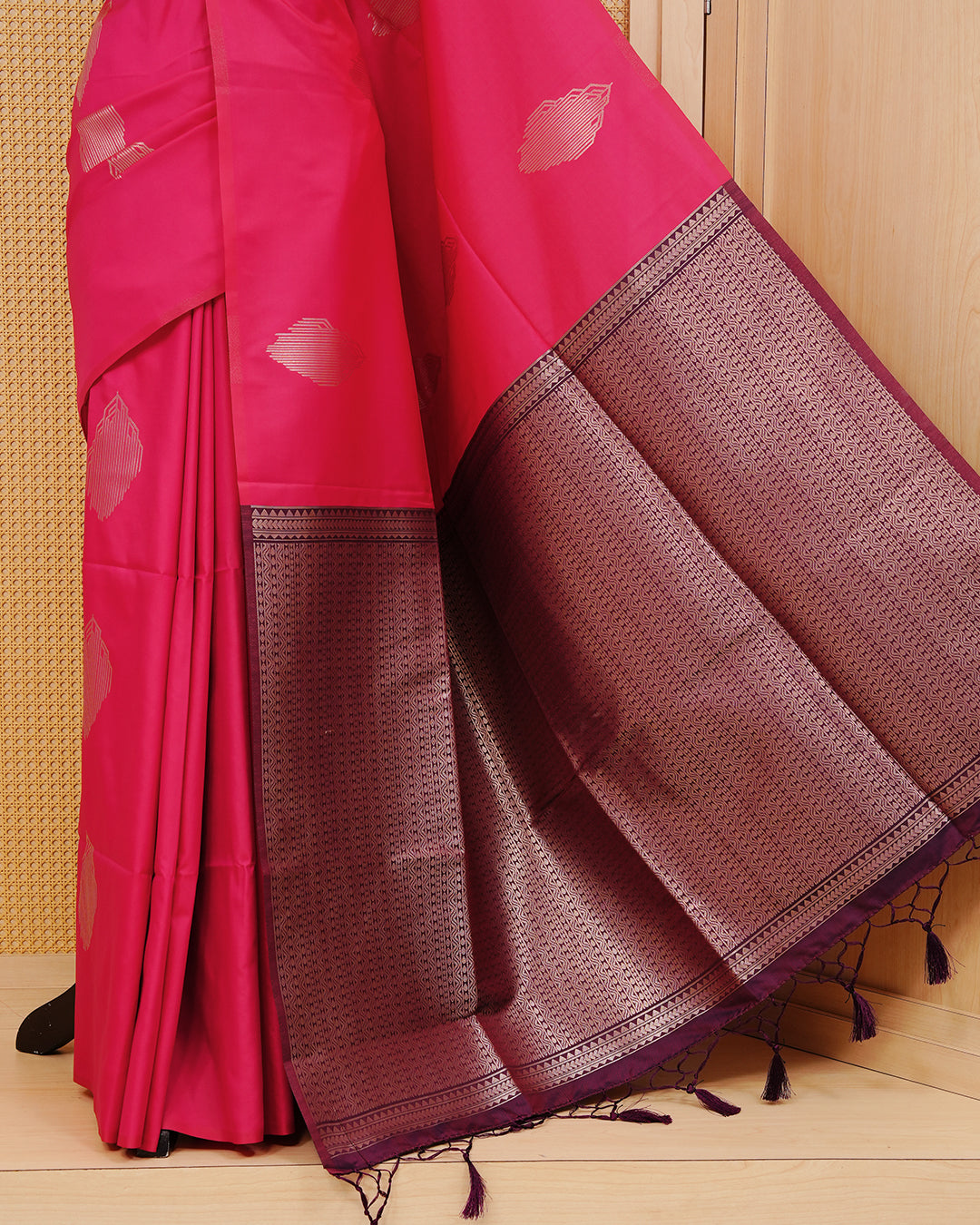 Rani Pink colour semi silk saree.