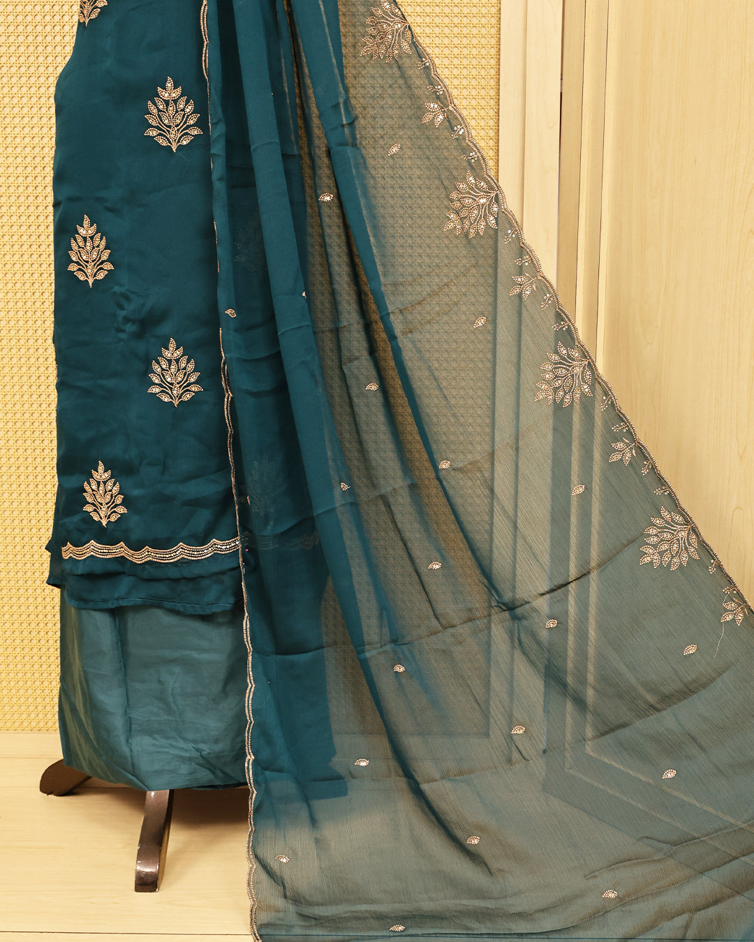 Teal colour salwar material featuring Thread with Sequin work on body, paired with matching bottom & dupatta.