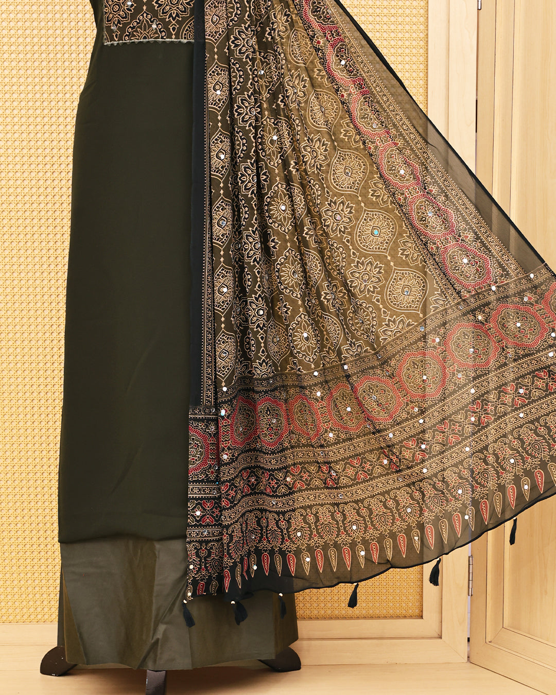 Olive Green colour Georgette Salwar material featuring Mirror with Design print work on body, paired with matching bottom & Dupatta.