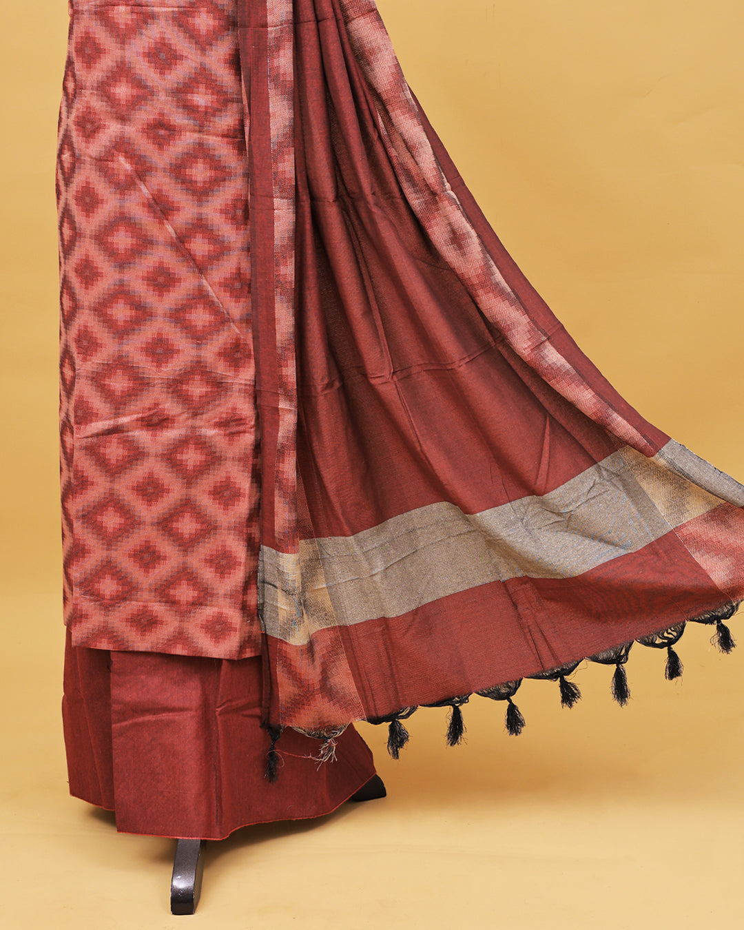 Brick red colour Net cotton Salwar material with Geometric pattern work on body, matching bottom & Dupatta.