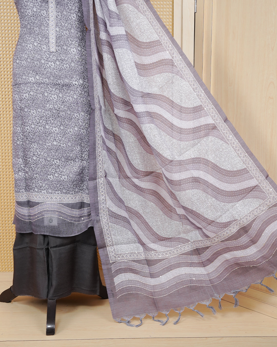 Greyish Purple colour Net Kota Salwar material featuring an elegant Kodi Print on the body, paired with a matching bottom and an elegant dupatta.