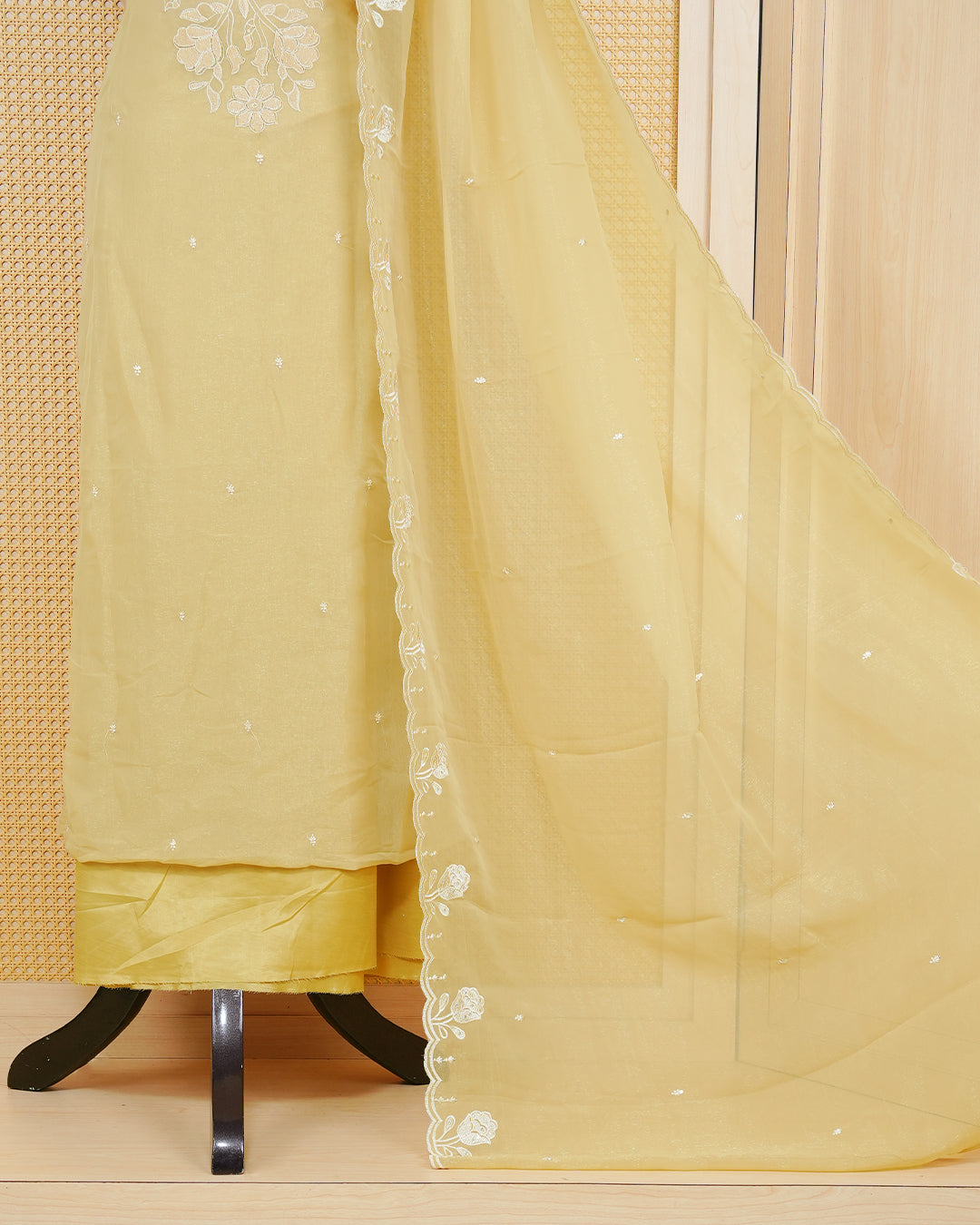 Pastal Yellow Georgette Salwar Material Features an Inrcate Floral Emproidary Pattern Aborned With Shimmering Sequin Accents, paired with matching bottom & elegant Duptta