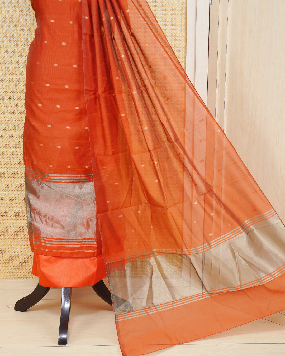 Bunt Orange Colour Mul Chanderi Salwar Material Featuring Gold Zari Buttas on body, Paired With Matching Mottom & Elegant Dupatta