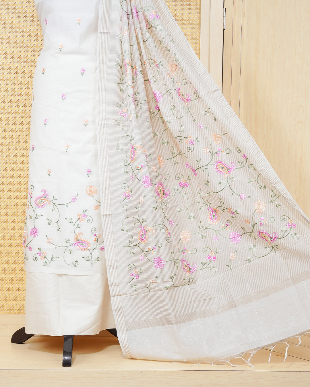 Cream colour tissue salwar material featuring an elegant floral Thread Work on Body , paired with a matching bottom and an elegant dupatta.