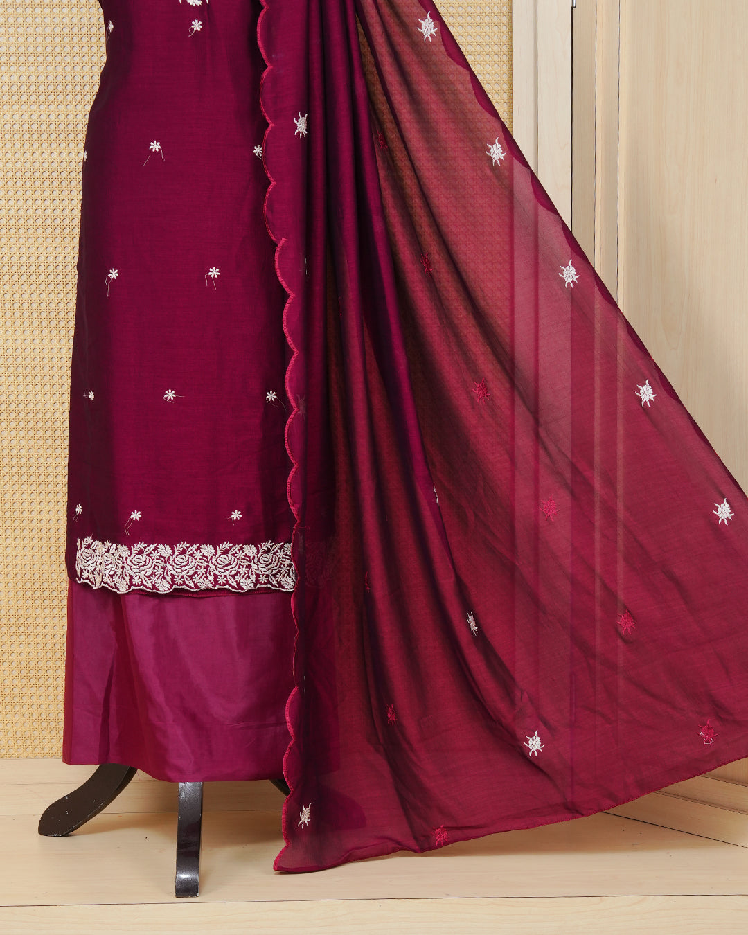 Maroon colour Georgette Salwar material featuring an Floral Threadwork on Body, paired with a matching bottom and an elegant dupatta.