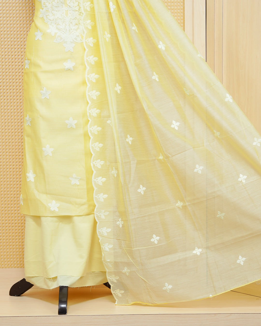 Pastel yellow salwar material featuring chikkankari work on body, comes with matching Bottom piece & Dupatta