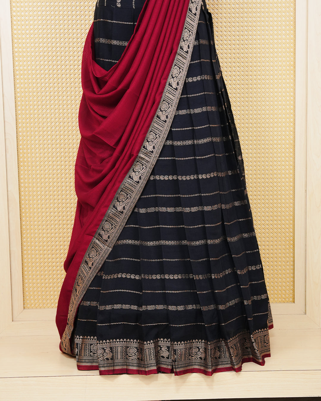 Black colour Chettinad Semi Stitched dhavani set Featuring black with light Gold zari strips on skirt, matching Blouse & Contrast dupatta.