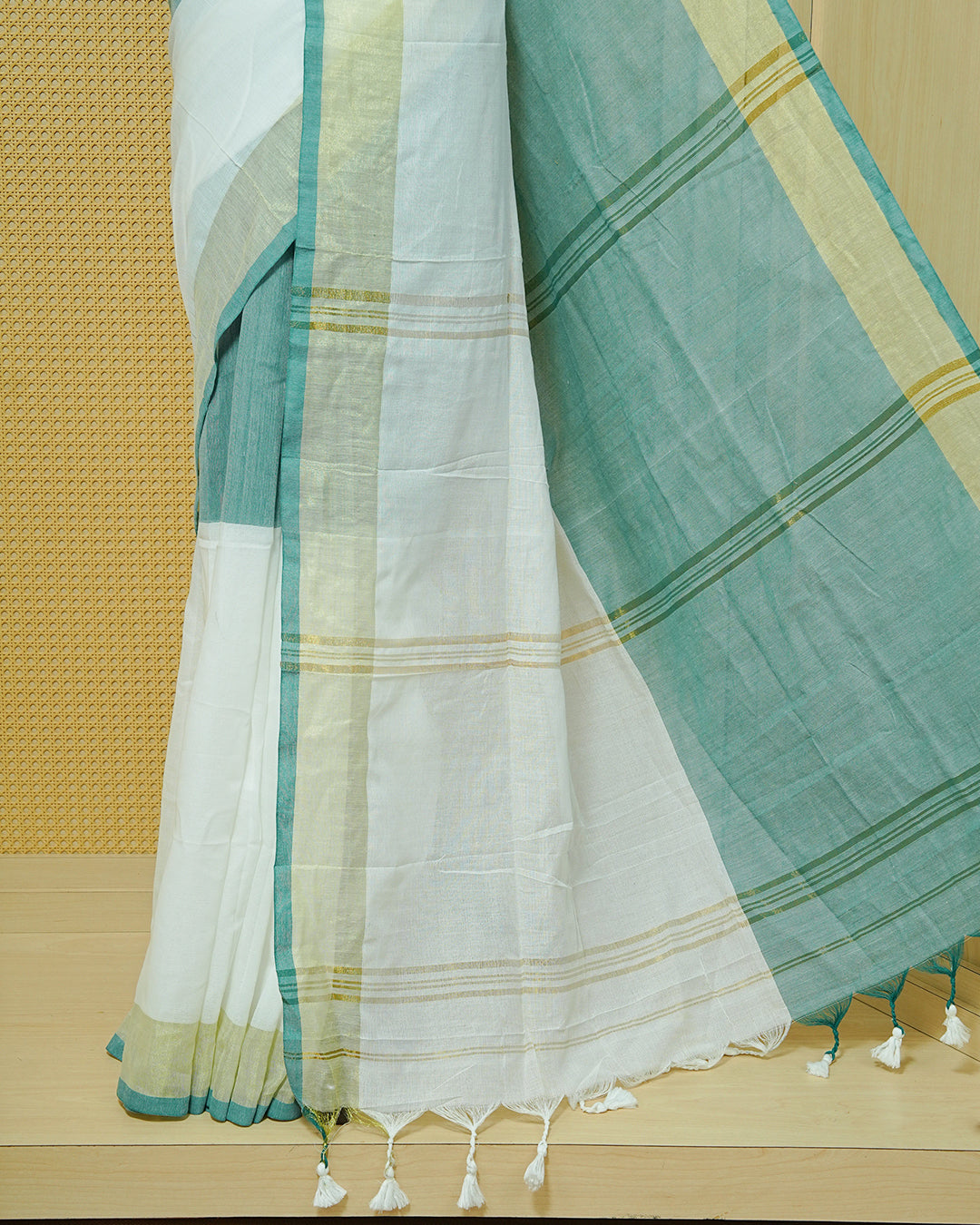 Sea Green & White Colour Half & Half Mul cotton saree Complemented by contrast colour Gold Zari Border & tassels.