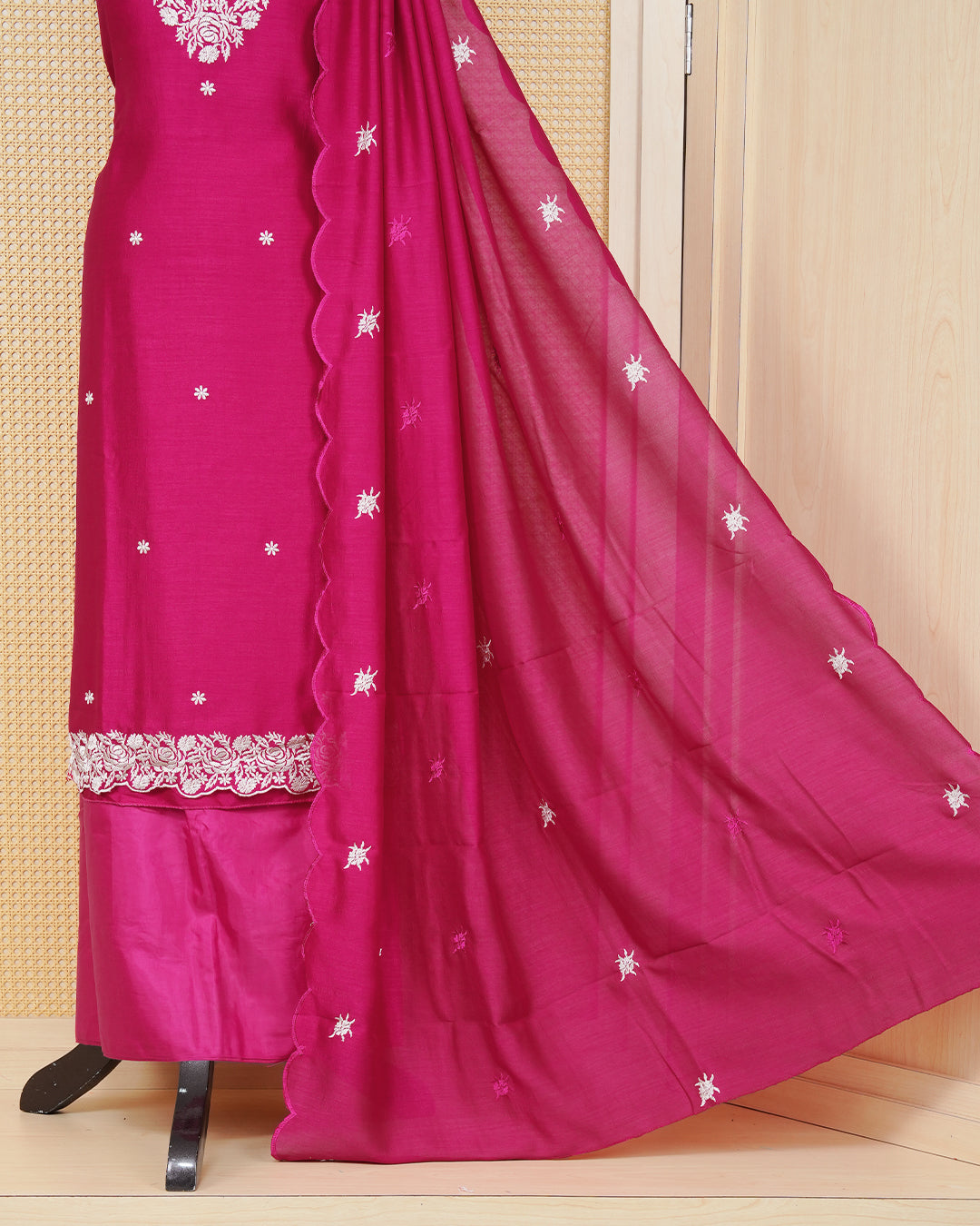 Rani pink colour Georgette Salwar Material Featuring an Floral Threadwork on The Body, Paired With a Matching Bottom and an Elegant Dupatta.