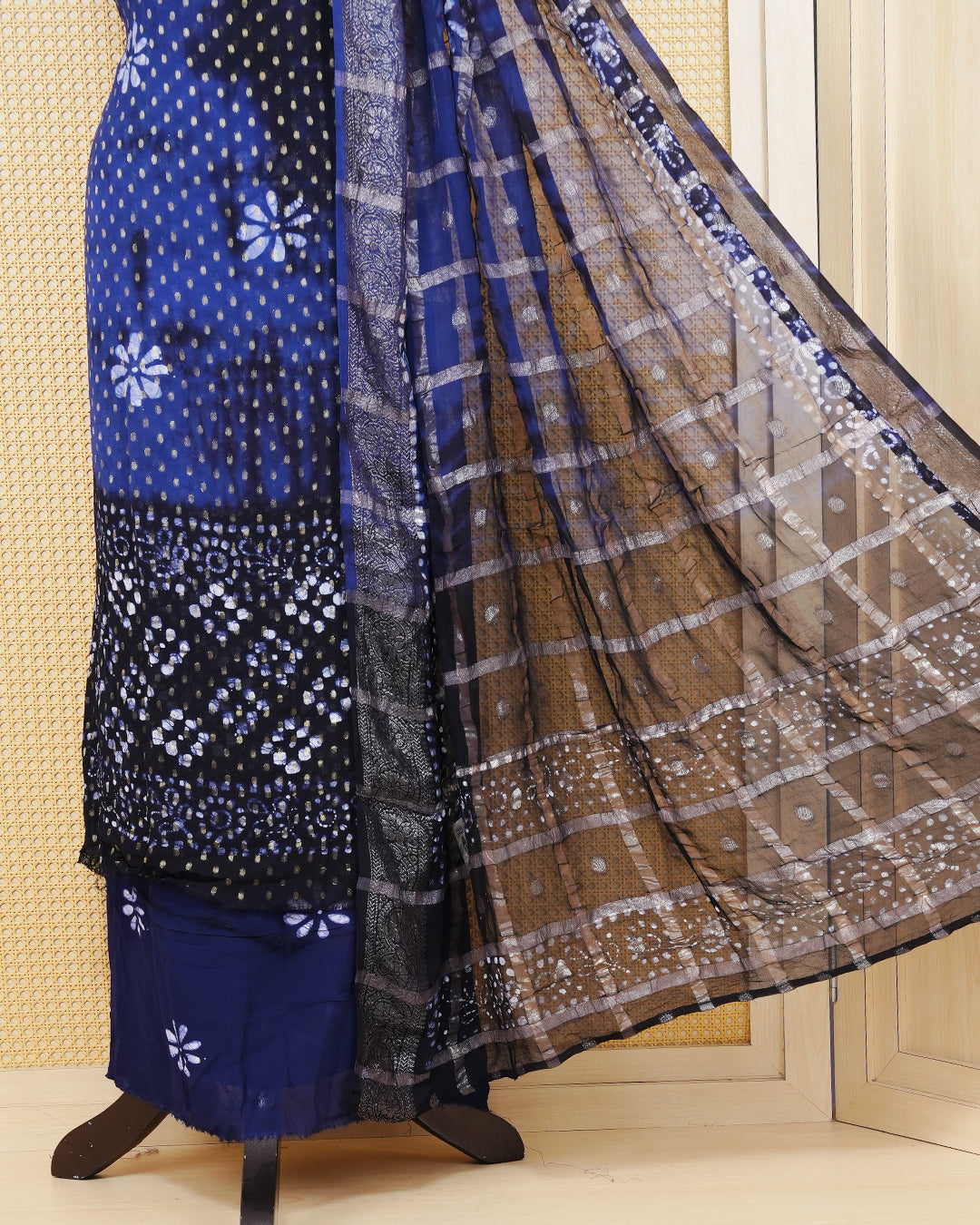 Navy Blue Georgette Salwar material Features a Vibrent Tie Dye Pattern Aborned With Shimmering Metallic Gold foil Dots,pired with matching bottom & elegant Duptta