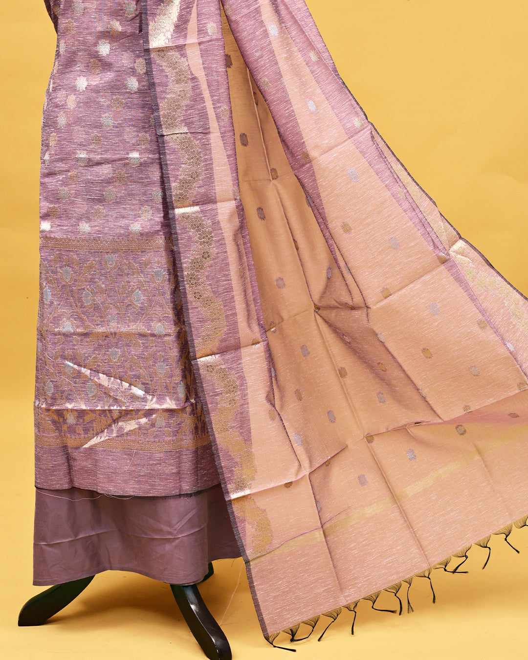 Lavender colour Tissue Salwar material with gold zari floral kodi pattern work on body, matching bottom & Dupatta.