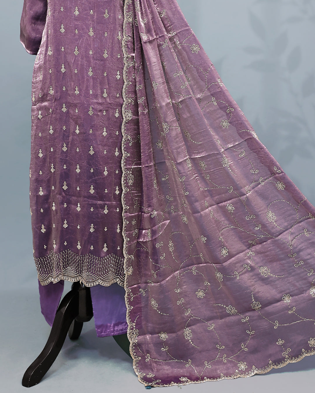 Lavender colour salwar set with Stone work on top, paired with matching bottom & Dupatta.