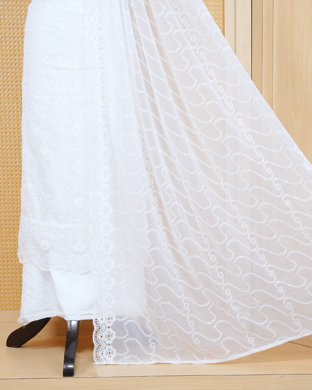 White Georgette Salwar Matierial Features an Intericat Floral Bead Work Pattern Aborned With Shimmering Sequins and Pearl Lace Border Work, Pired with matching bottom & elegant Duptta