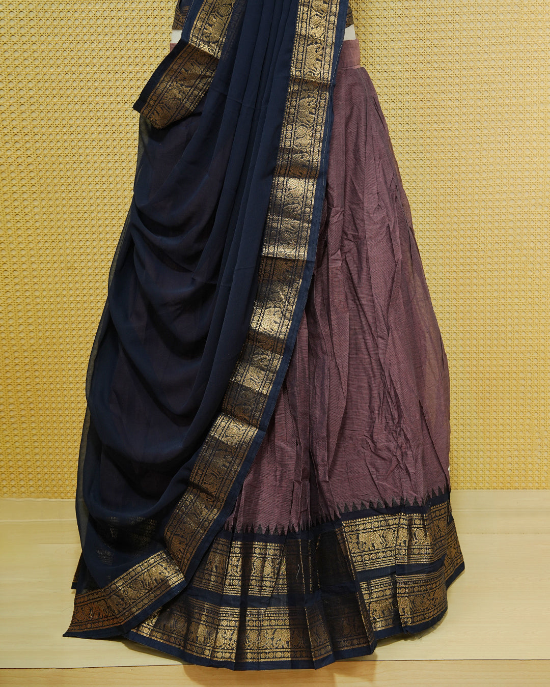Pinkish grey colour Chettinad Semi Stitched dhavani set Featuring contrast Navy blue with Gold zari border on skirt, Contrast Blouse & matching dupatta.