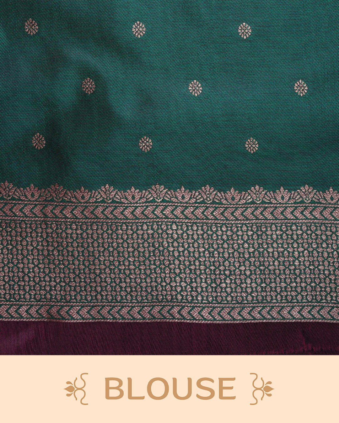 Maroon colour Mulberry silk saree featuring gold floral zari patterns on body, paired with contrast green colour with traditional border, comes with matching blouse piece.