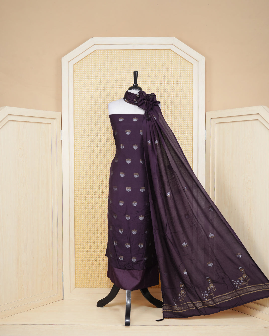 Dark Burgandy colour Georgette Salwar material Featuring Gold & silvar zari floral motifs on body, paired with matching bottom & Elegant Dupatta
