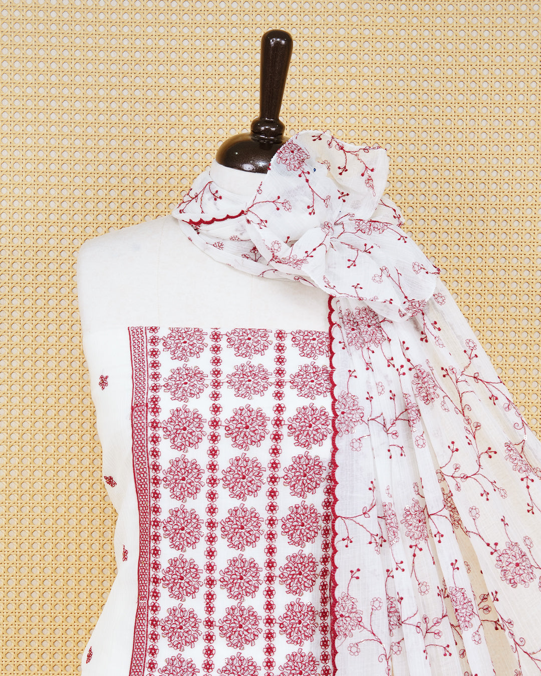 White colour Georgette Salwar material Featuring Gold zari floral motifs on body, paired with matching bottom & Elegant Dupatta