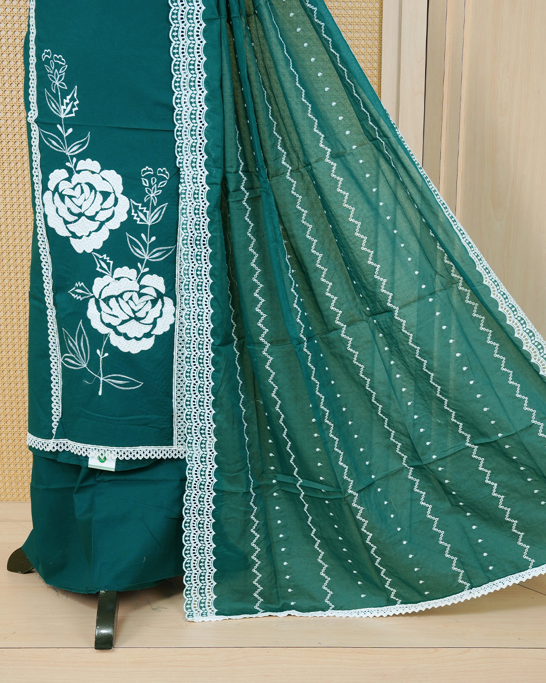 Peacock green colour Cotton Salwar Material Featuring an Threadwork on Body, lace work on neck portion, Paired With a Matching Bottom and an Elegant Dupatta.