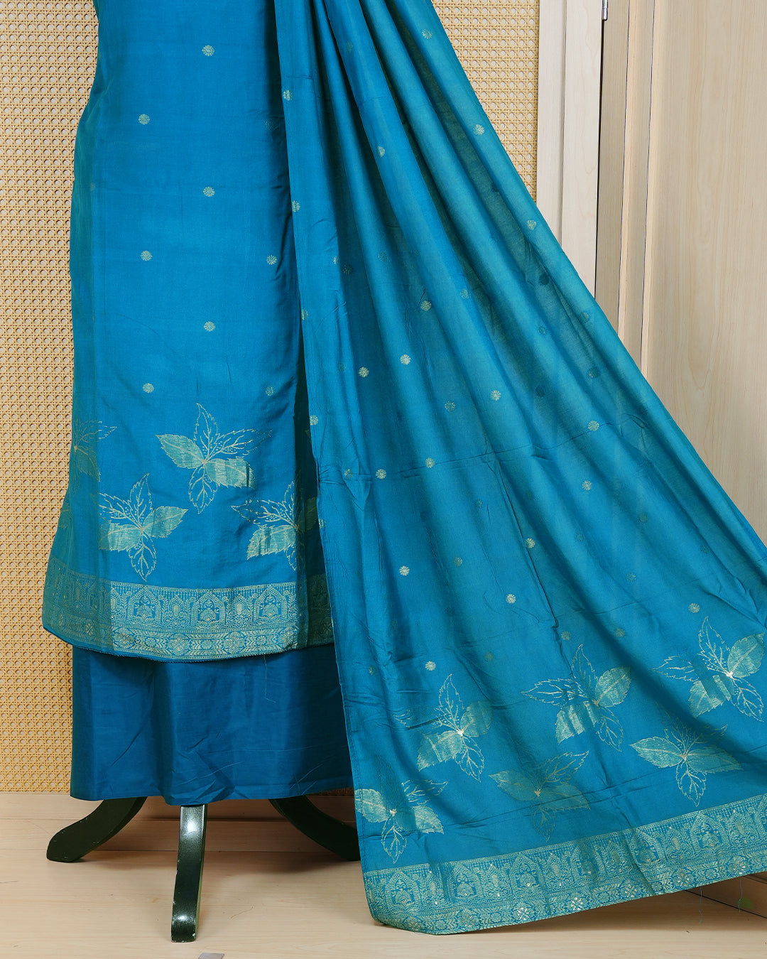 Teal Blue colour Banares Salwar material Featuring Gold zari floral motifs on body, paired with matching bottom & Elegant Dupatta