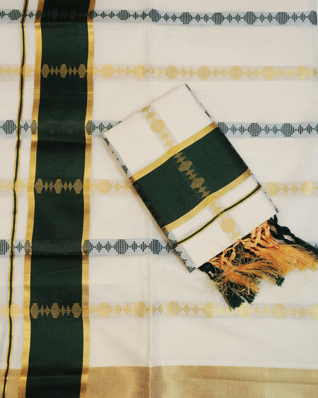 Cream colour cotton set mundu featuring Gold & Dark Green Strips on body, featuring Classic Dark Green & gold Kasav kara.