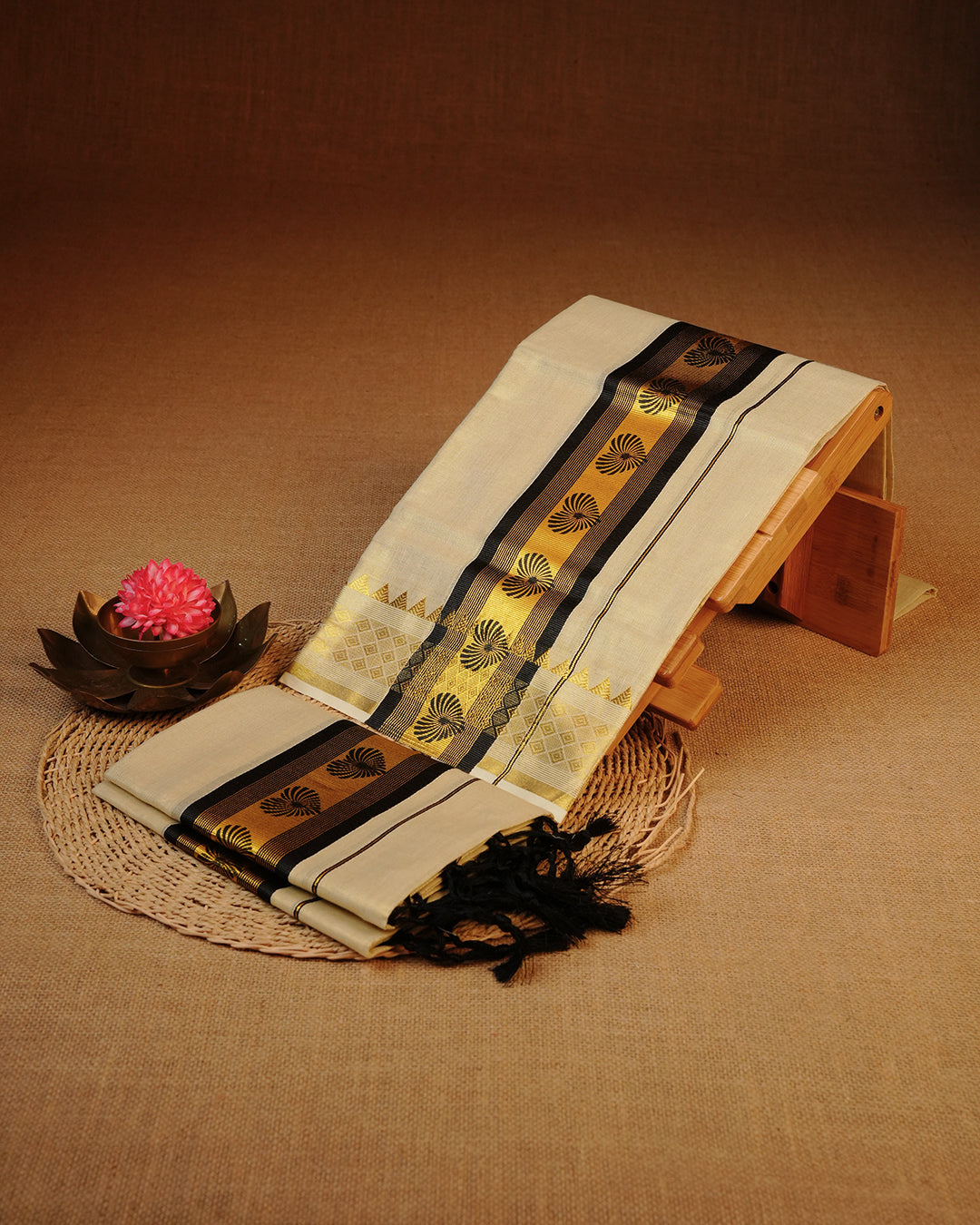 Cream colour Tissue silk set mund Featuring Elegant plain body, Complemented by Black print with zari border.