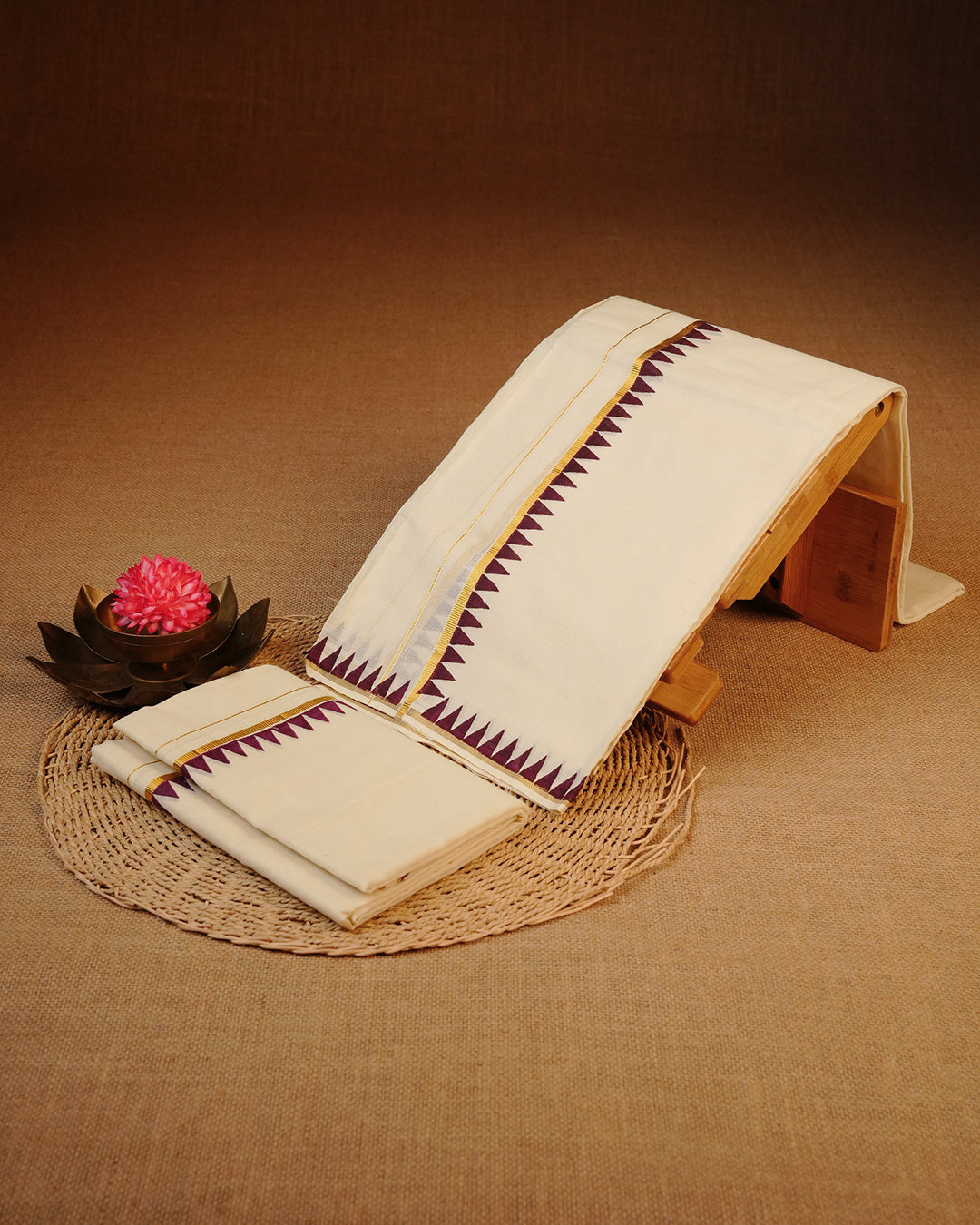 Cream colour cotton Set Mundu With Plain body, enhanced with gold Kasav With Temple Printed kara.