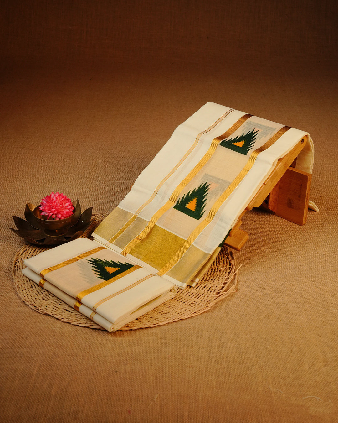 Cream colour cotton Set Mundu With Plain body, enhanced with gold Kasav With Temple Printed kara.