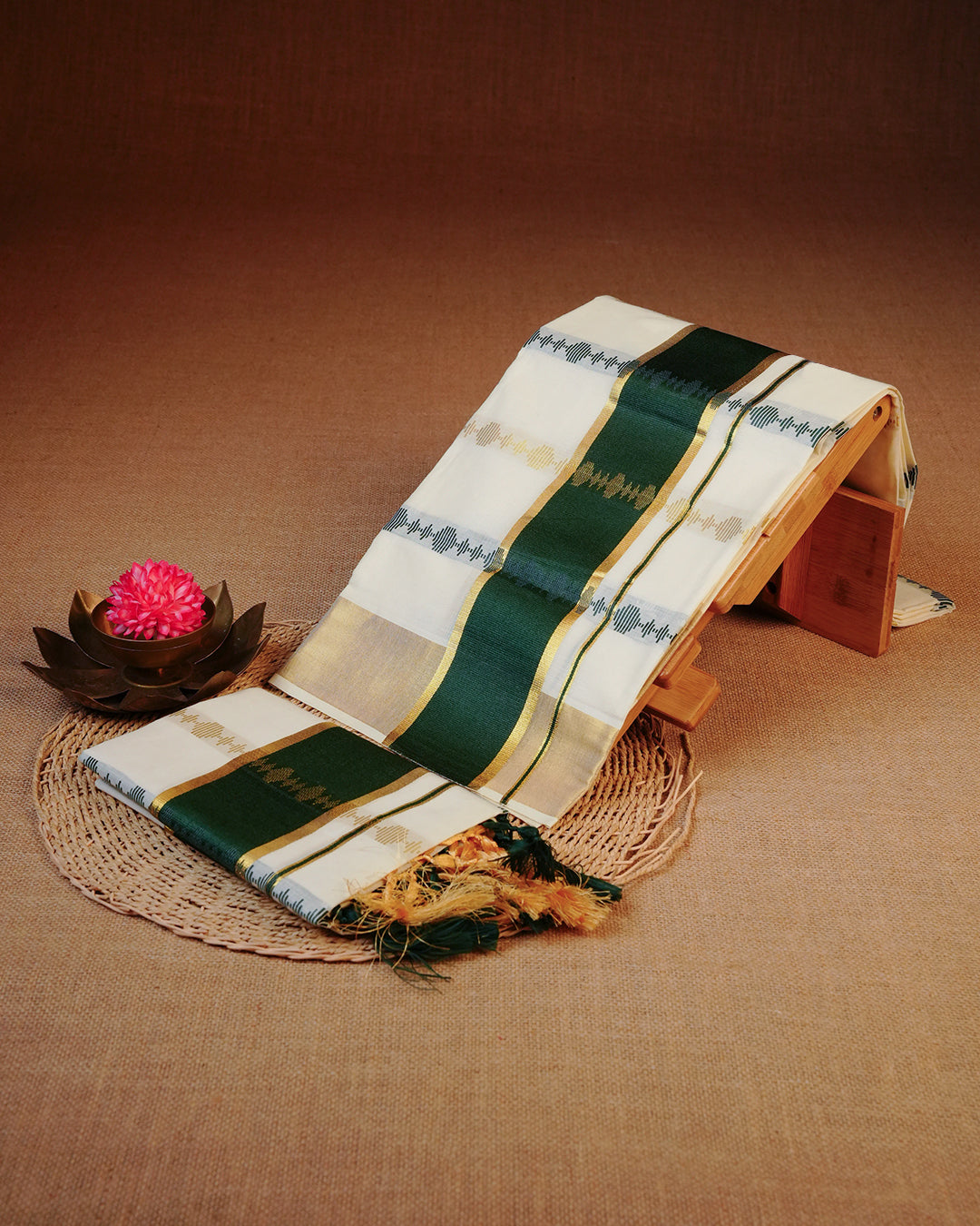 Cream colour cotton set mundu featuring Gold & Dark Green Strips on body, featuring Classic Dark Green & gold Kasav kara.