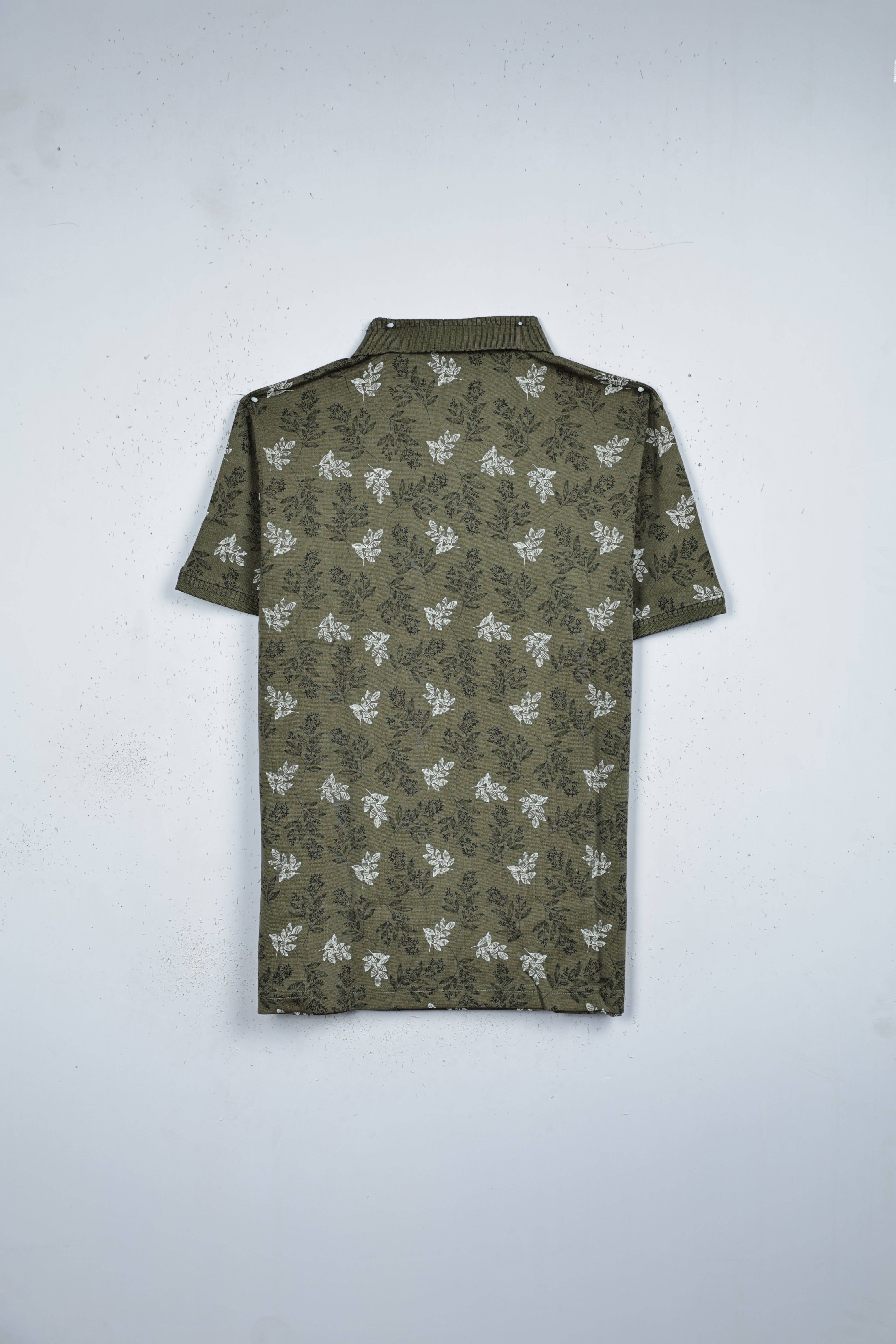 Olive green colour T shirt featuring collar design neck, floral print on body, half sleeve.