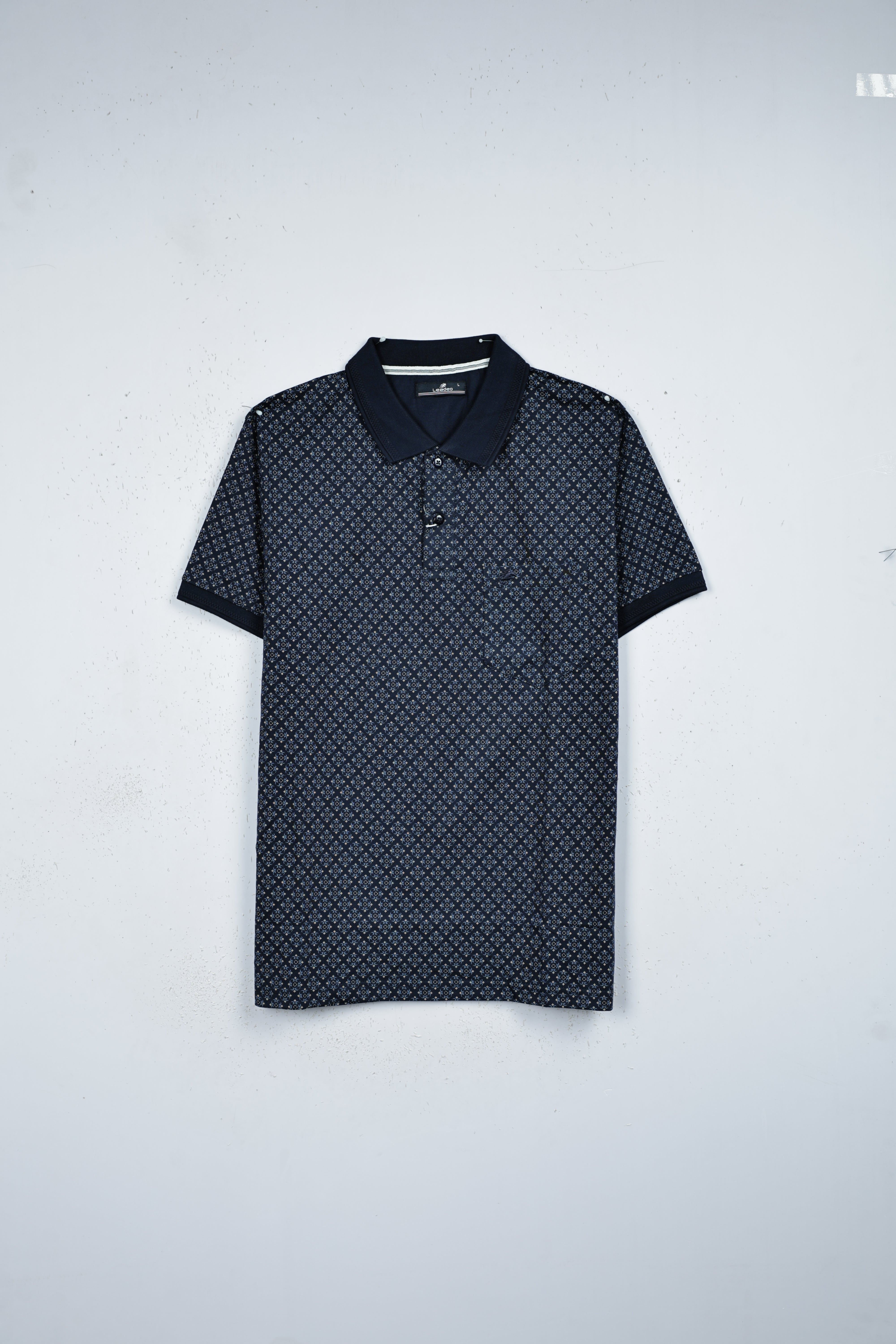 Blue colour t shirt featuring collar design neck, small floral Print on body, Half sleeve.