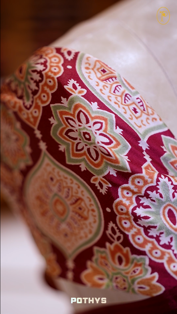 Maroon Semi modal silk saree featuring traditional Ajrakh print with intricate motifs and contrast borders, paired with a perfectly matching blouse & A timeless piece blending heritage with grace.