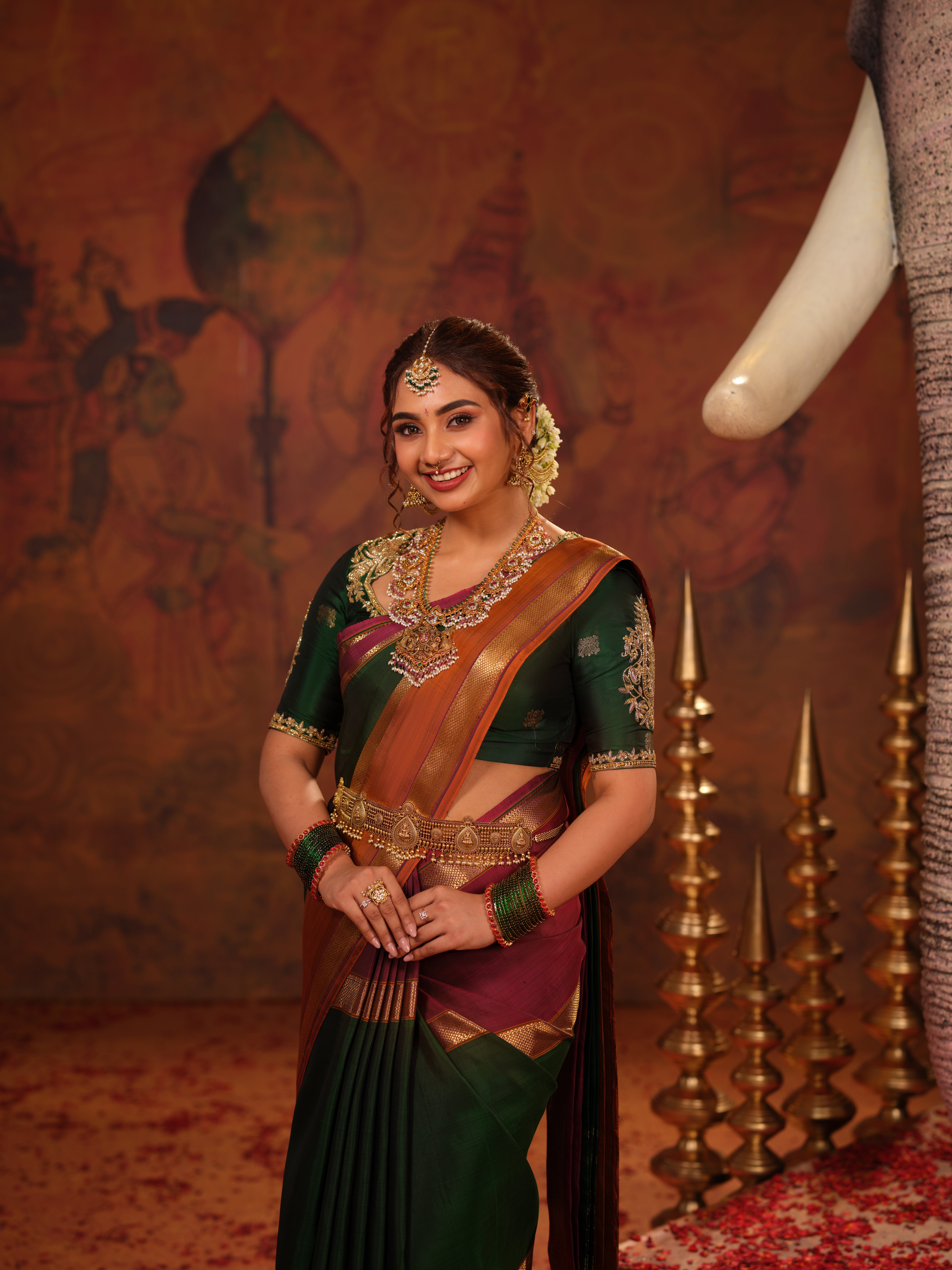 Traditional Mubbakam Kanchipuram Pure Silk Saree, handwoven with rich pure zari detailing. Featuring a classic green and maroon colour combination, enhanced with elegant traditional zari borders and pallu.