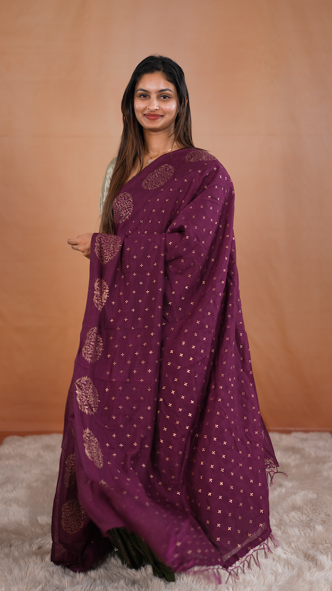 Wine colour vijithra silk saree featuring small zari details on body, Tree design border.