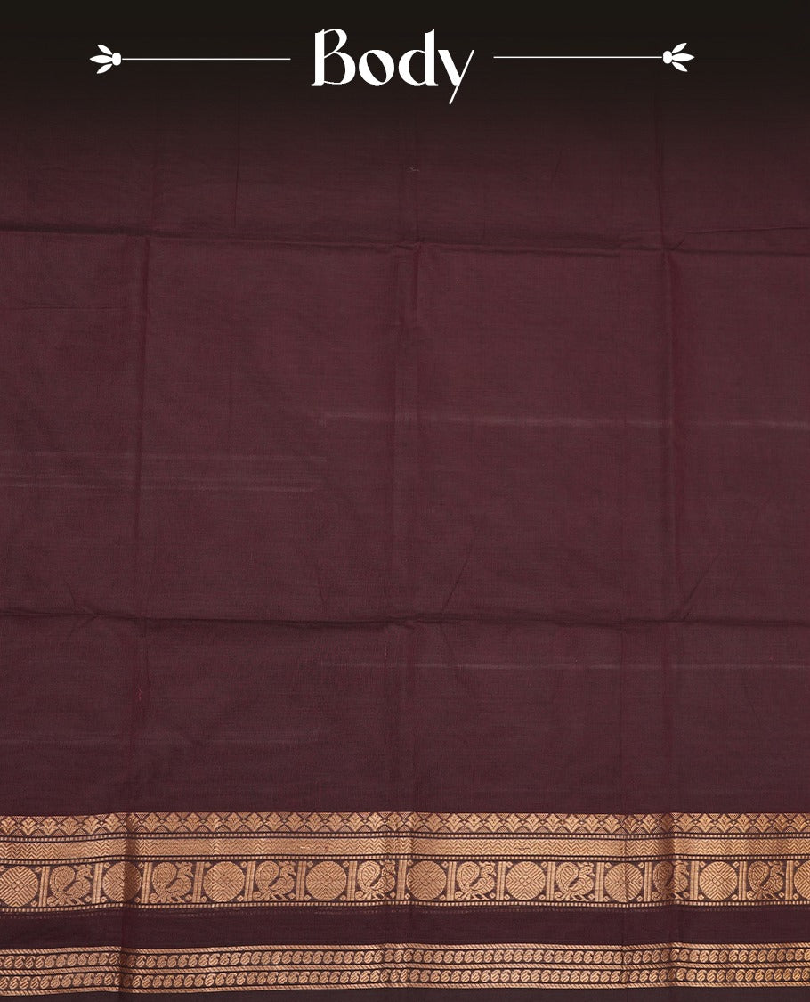 Dark chocolate colour Chettinad cotton saree with a plain body, featuring a traditional border and pallu with gold zari detailing, paired with a matching blouse piece.