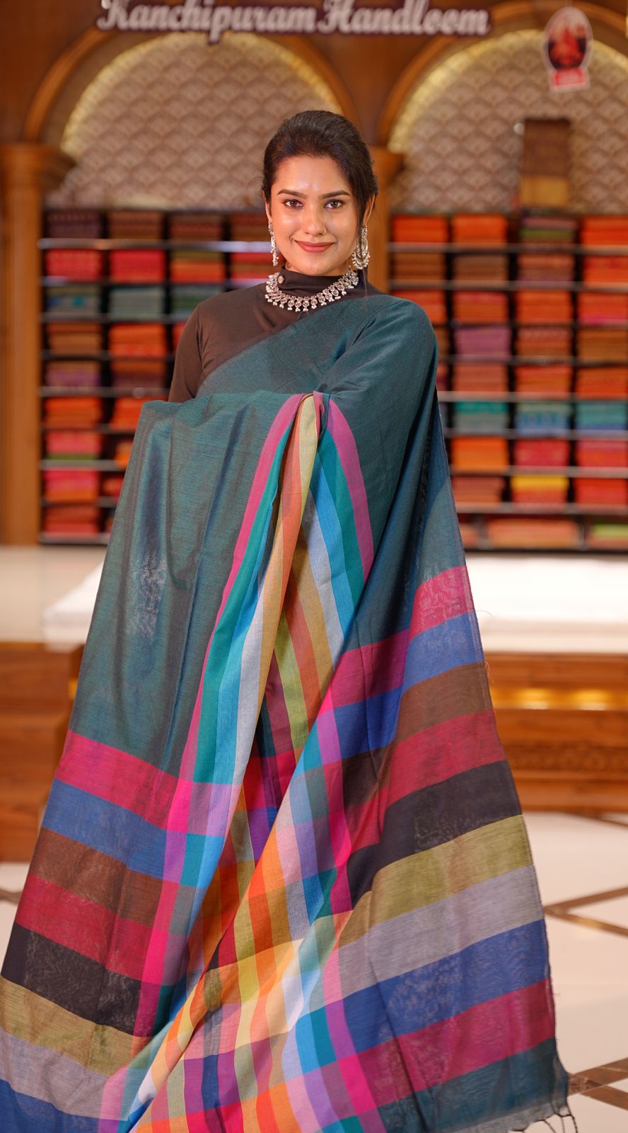 Peacock Blue Colour Mul Cotton Saree featuring Multi colour Line pattern on body, enhanced with Multi colour Pallu.