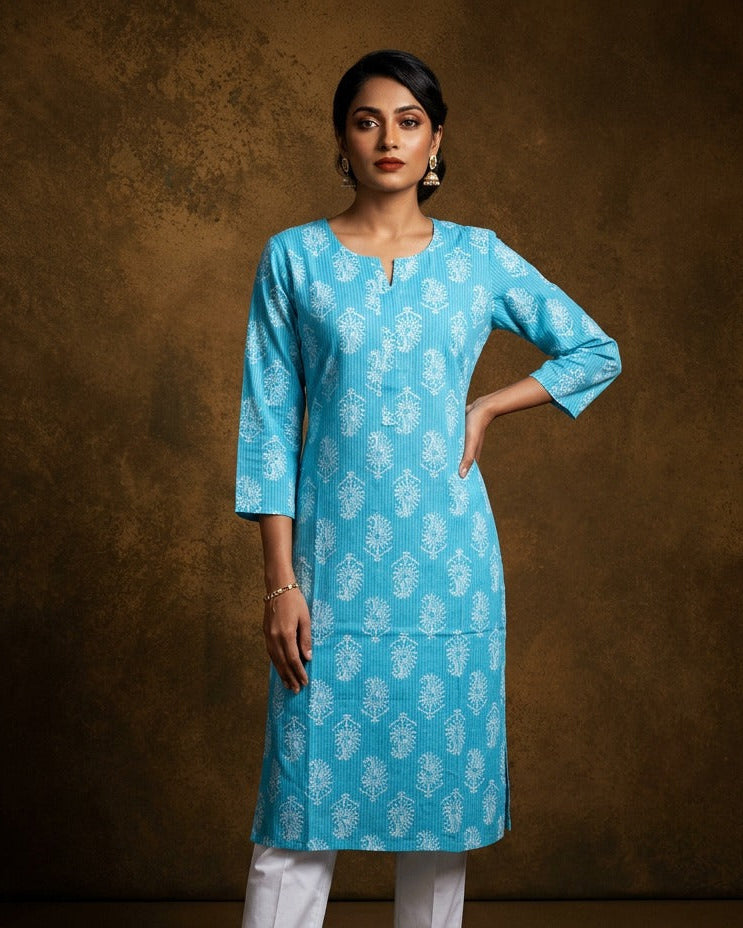 Sky colour kurti with White floral prints, knee length design, styled with a round with slit neckline and a sleeve .
