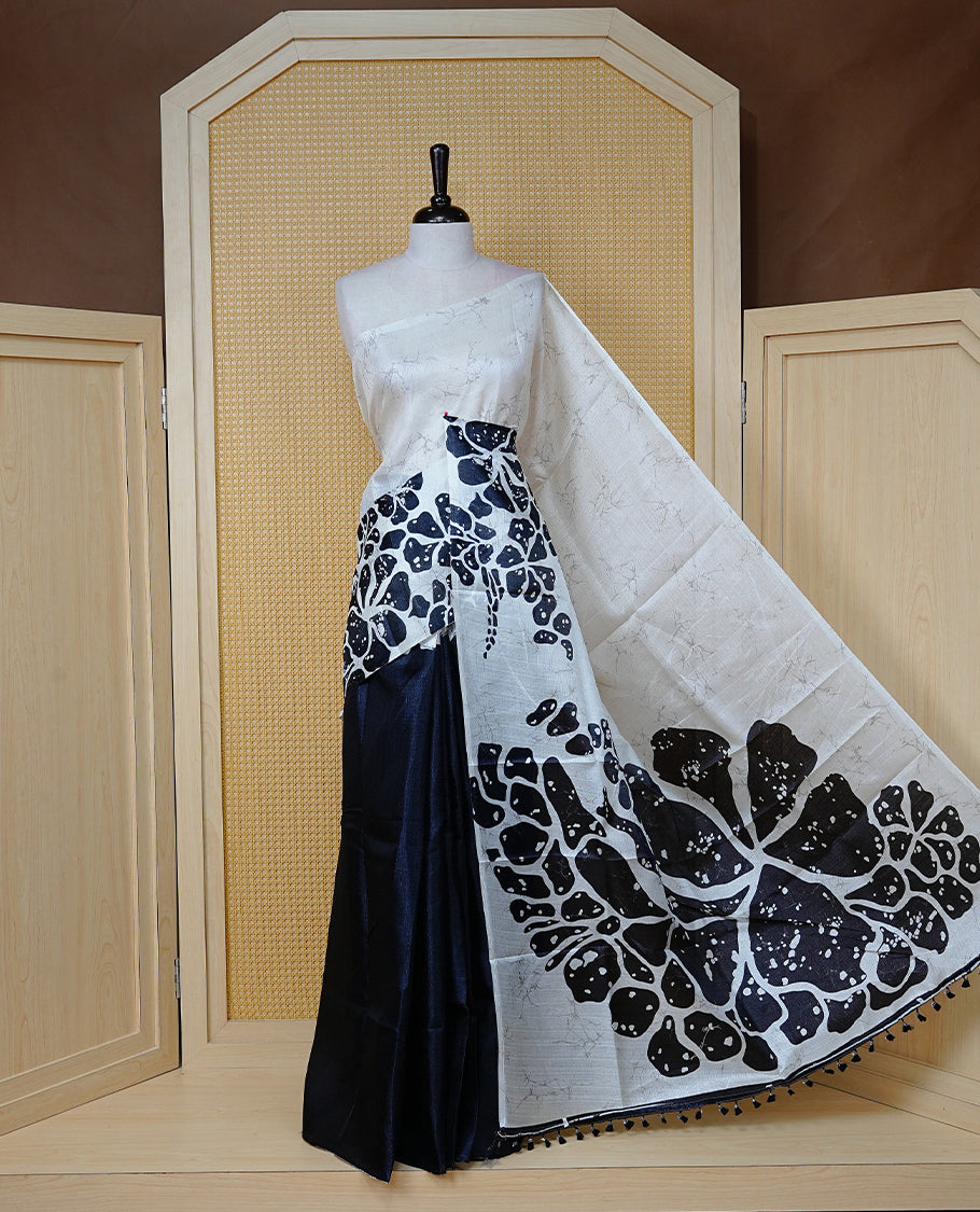 Black With white colour Semi khadi silk saree featuring floral Print on body, enhanced with contrast Printed pallu, Comes with matching blouse piece.