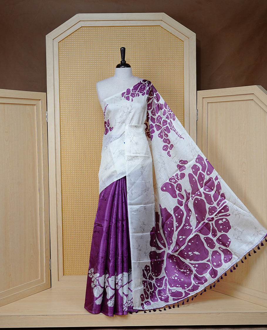 Purple With white colour Semi khadi silk saree featuring floral Print on body, enhanced with contrast Printed pallu, Comes with matching blouse piece.