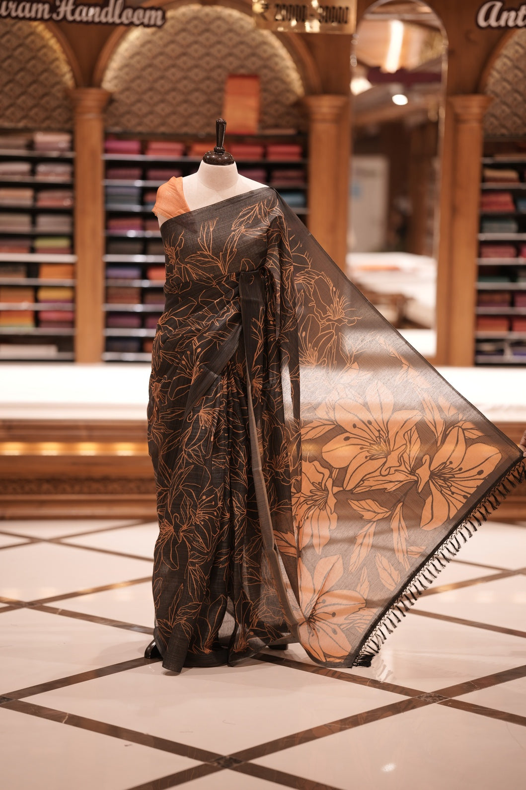 Black & Yellow colour Semi linen tissue saree featuring full digital floral prints across the body, The saree is highlighted with a contrast floral printed pallu and comes with a plain contrasting blouse piece.