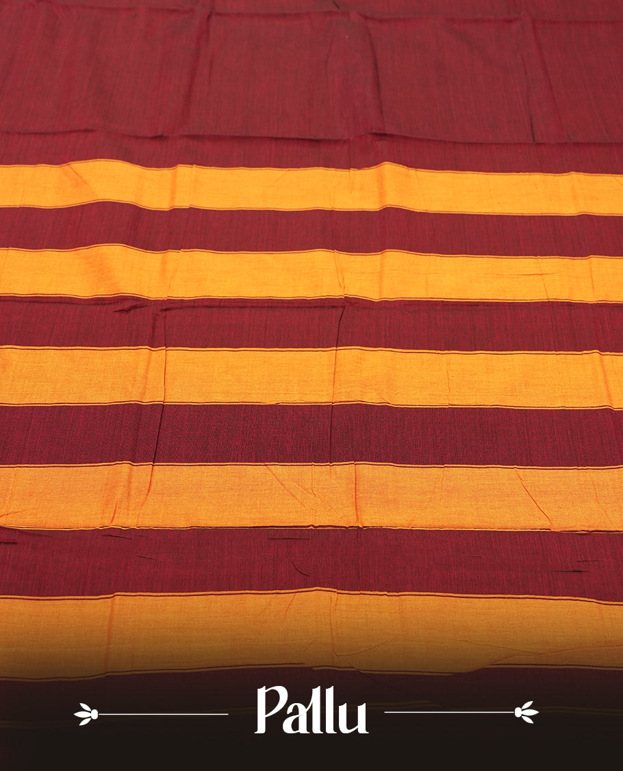 Dark Maroon colour Narayanapattu cotton saree featuring a self coloured body, yellow coloured with silver zari pattern border and pallu, pairing a matching blouse piece.