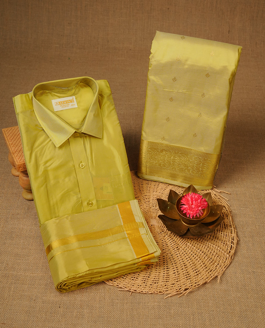 Gold colour shirt and dhoti with gold colour border, paired with matching colour silk saree featuring gold zari buttas and traditional border paired with matching blouse piece.