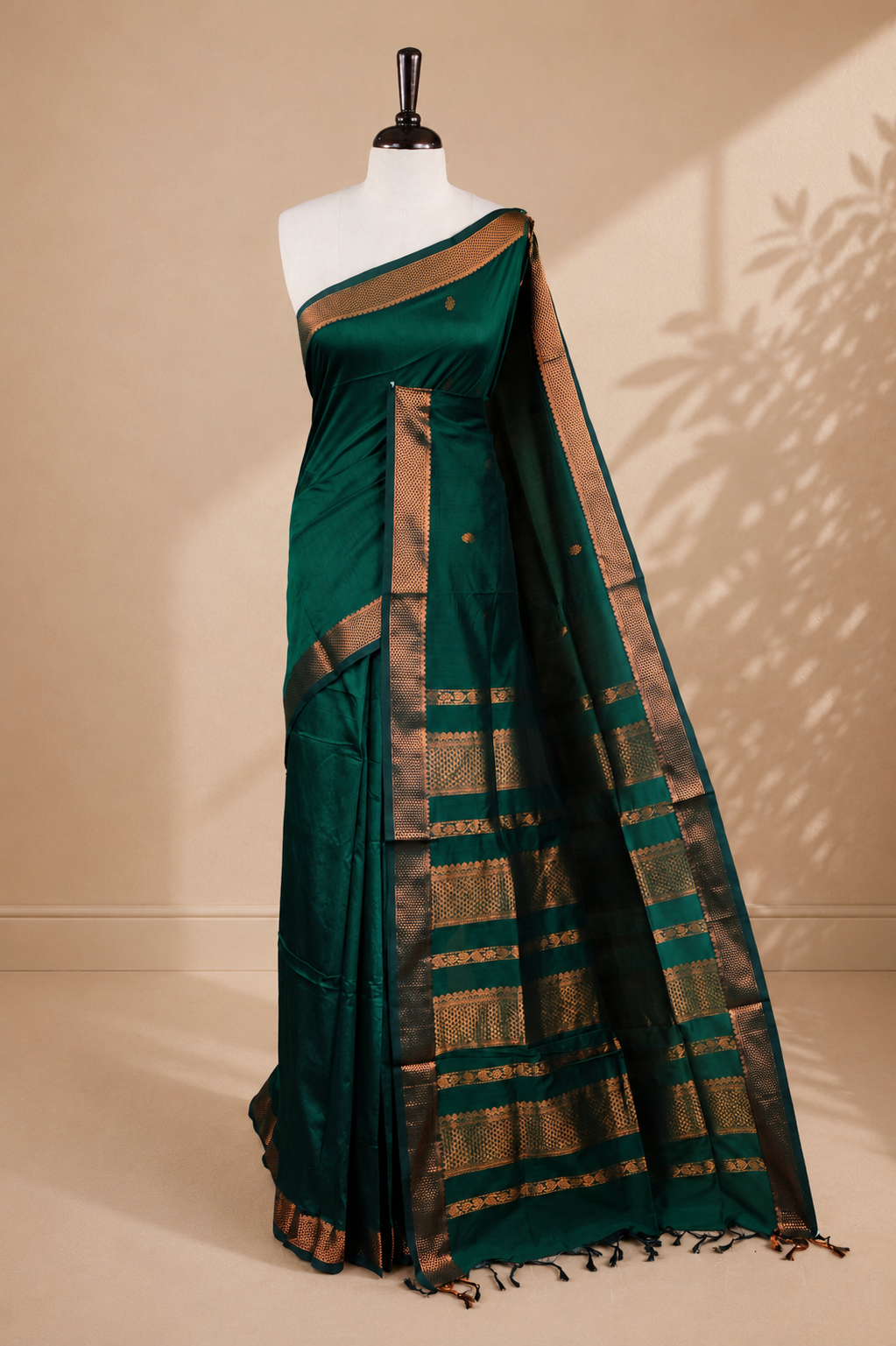 Green colour kalyani cotton saree featuring antique zari motifs on body, complemented by Self colour with Antique zari border, paired with matching blouse piece.