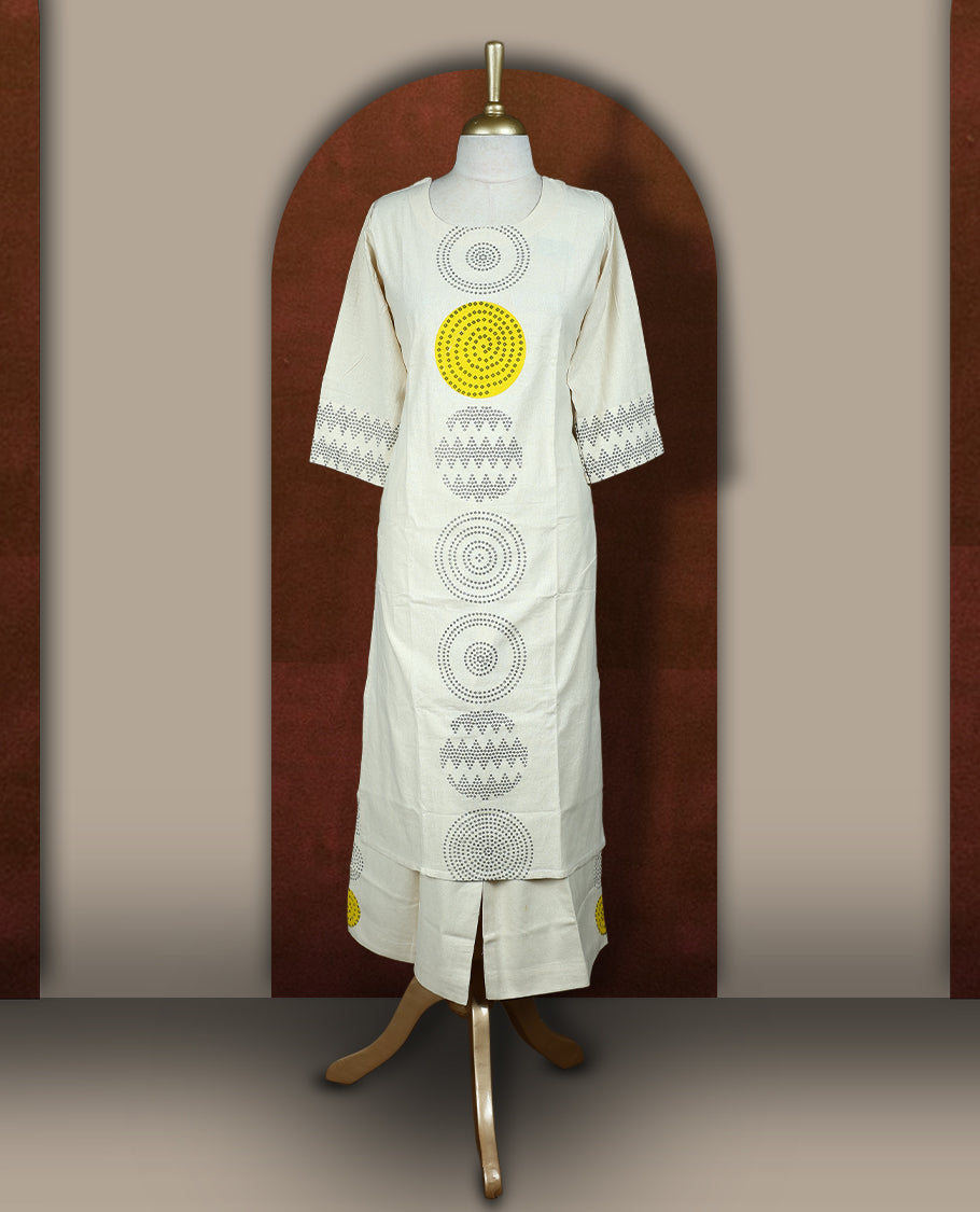 Cream colour cotton coord set with bold geometric prints and a pop of yellow, Features a round neck kurta with 3/4th sleeves and matching straight pants.
