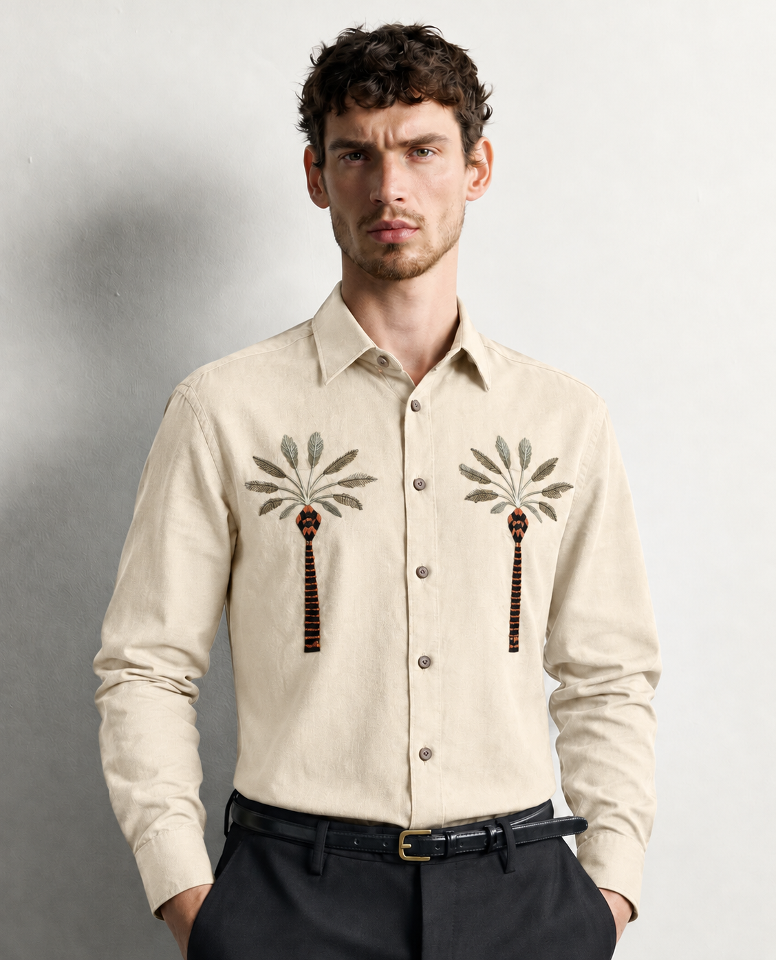 Cream colour full sleeve shirt with a tree embroidery pattern on the body.