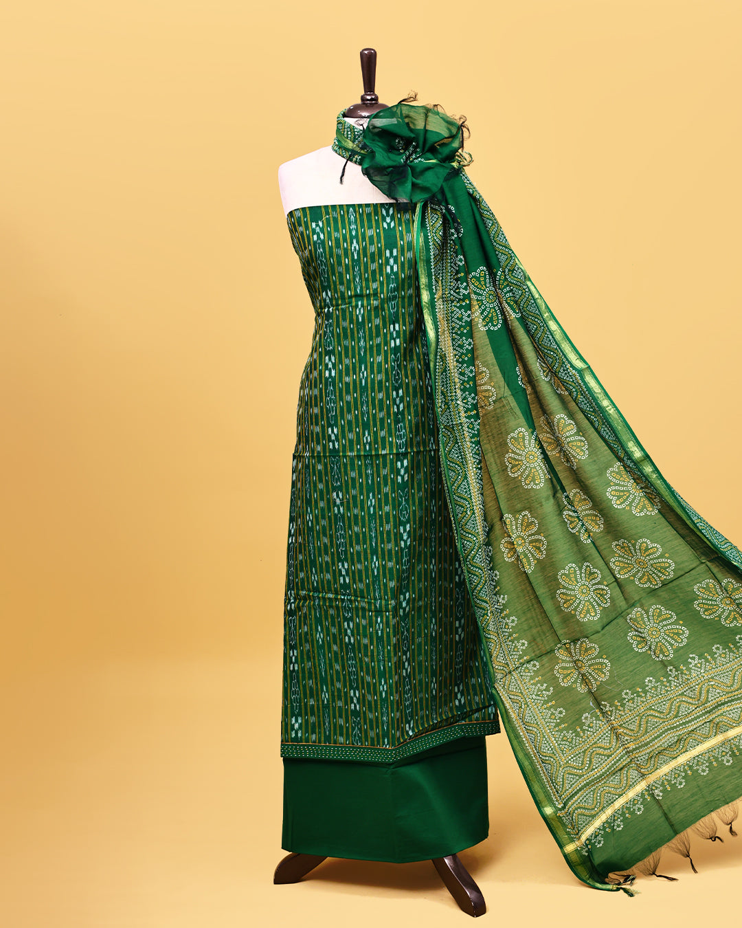 Green colour cotton Salwar material with Strip pattern on body, matching bottom & Dupatta.
