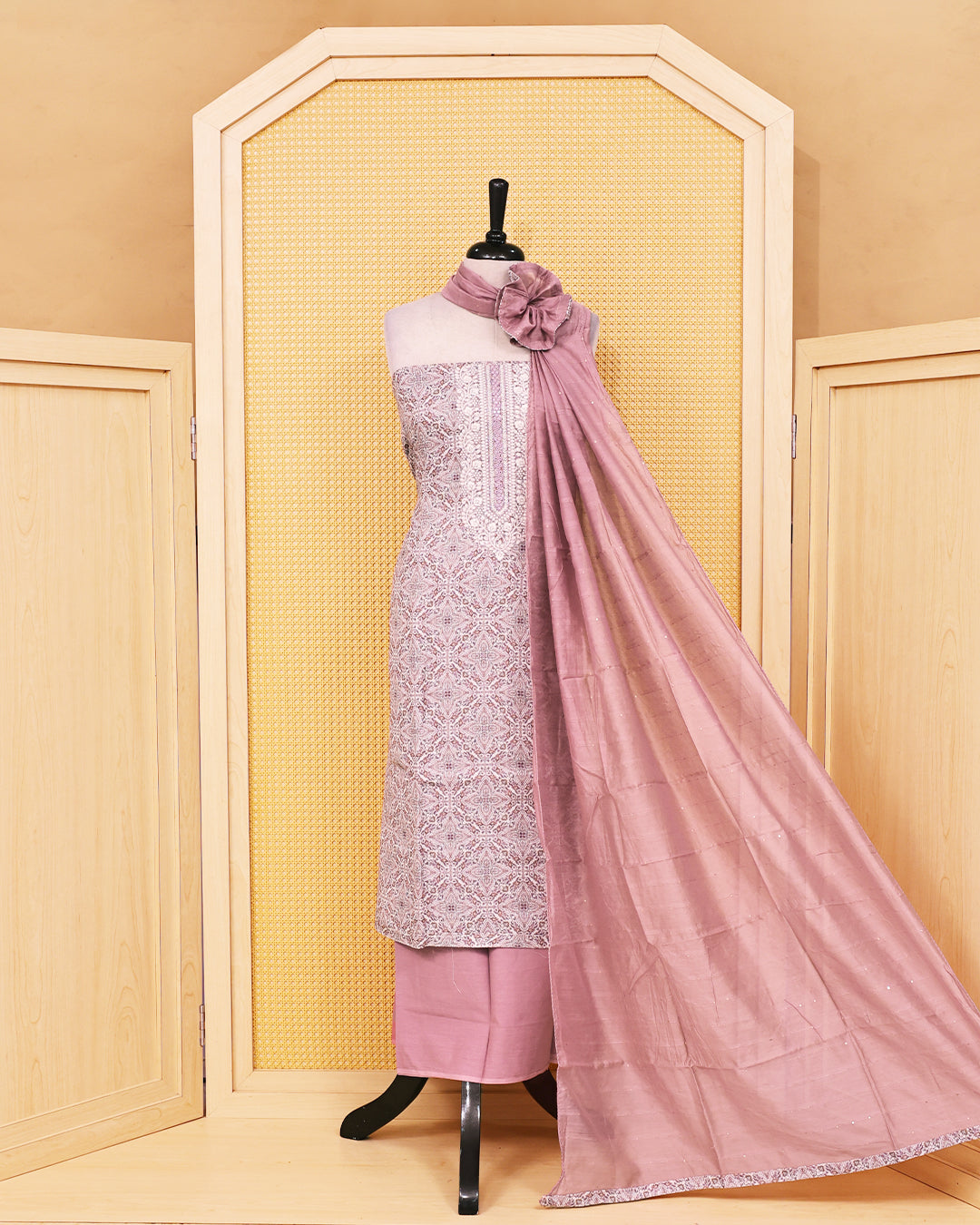 Dusty Pink colour linen Salwar Material featuring elegant printed patterns on the kurta, paired with a matching bottom and a self coloured sequins embellished dupatta.