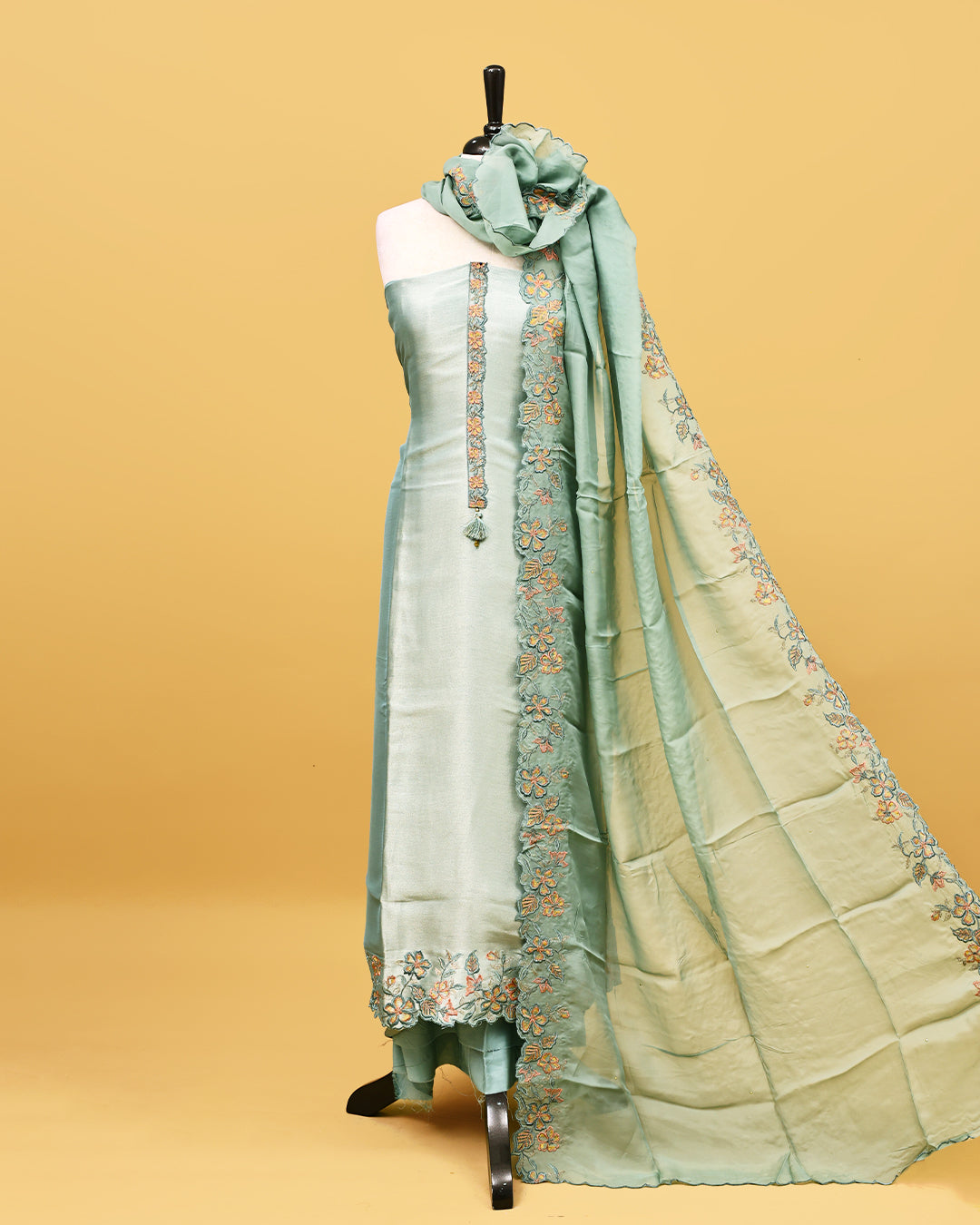 Pastel Aqua colour Organza Salwar material with Thread work on body, matching bottom & Dupatta.